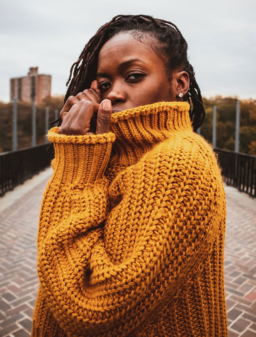 High neck drop hem sweater